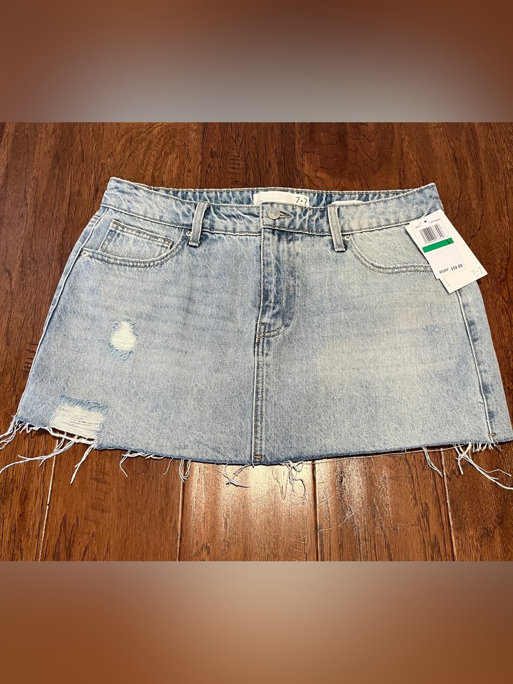 7 For All Mankind Light Wash Distressed Denim Mini Skirt